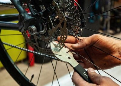 Professional bike repair LA by The Bike Man Services, technician tuning and repairing a road bike in Los Angeles